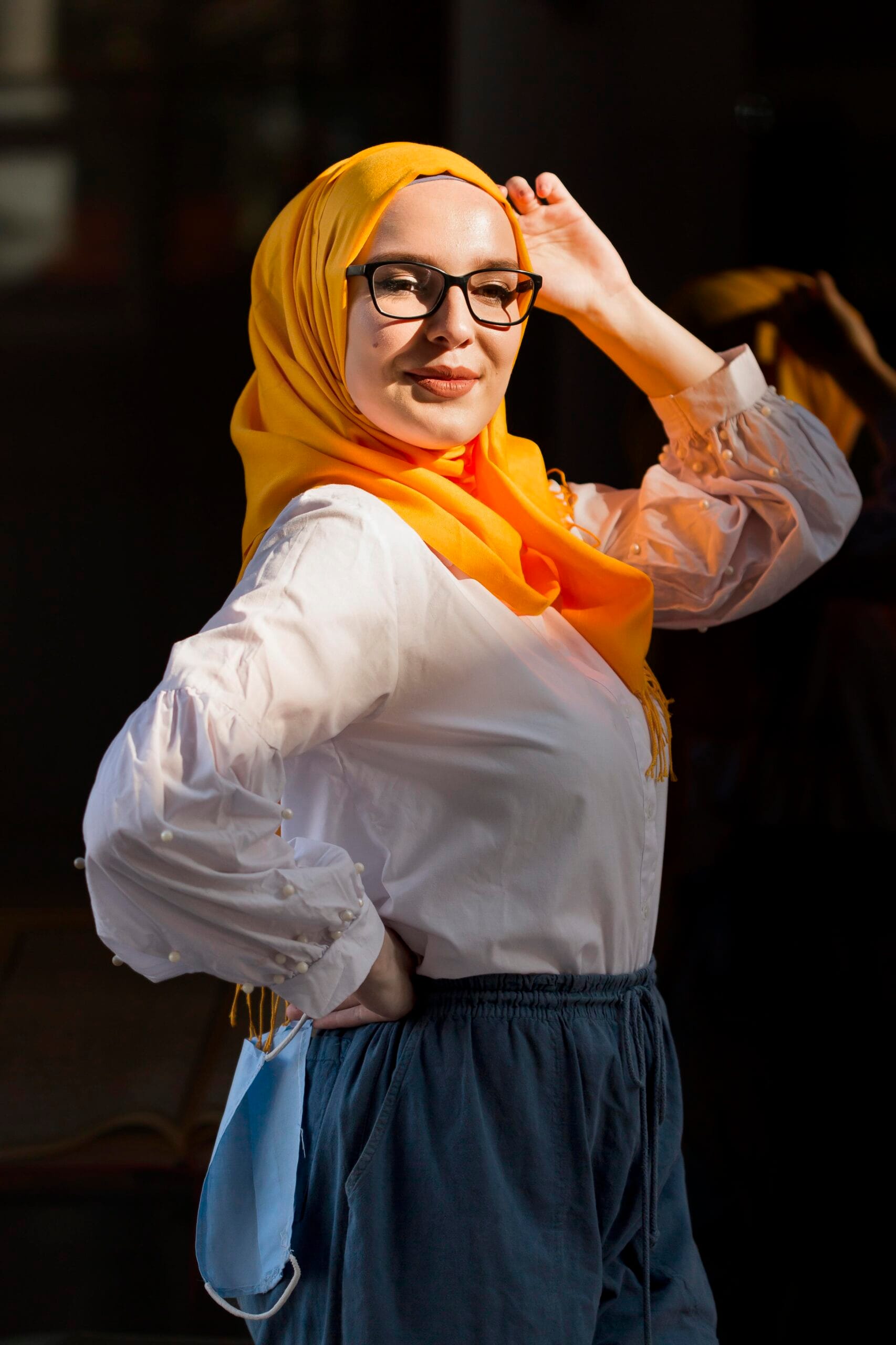woman-holding-medical-mask-posing